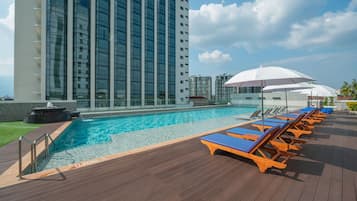 Outdoor pool, open 8:00 AM to 8:00 PM, pool umbrellas, pool loungers