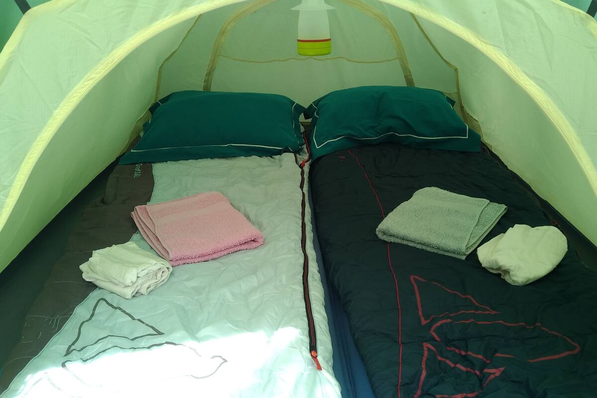 Basic Tent | Blackout curtains, free WiFi, bed sheets