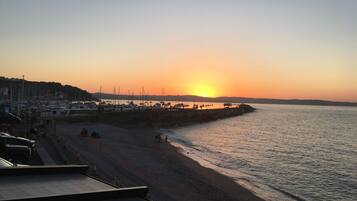 Beach nearby, sun loungers