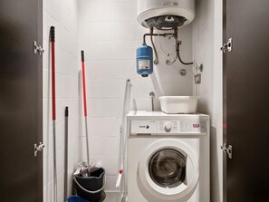 Bathtub, hair dryer, towels
