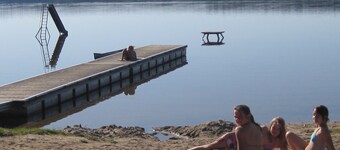 Sweden villa with 2 boats on Lake Useriner at Müritz National Park