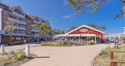 1 beach location, next to a park, with swimming pool, game room