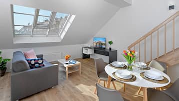 Exclusive-penthouselejlighed - flere senge - terrasse - byudsigt | Opholdsområde | Fladskærms-tv