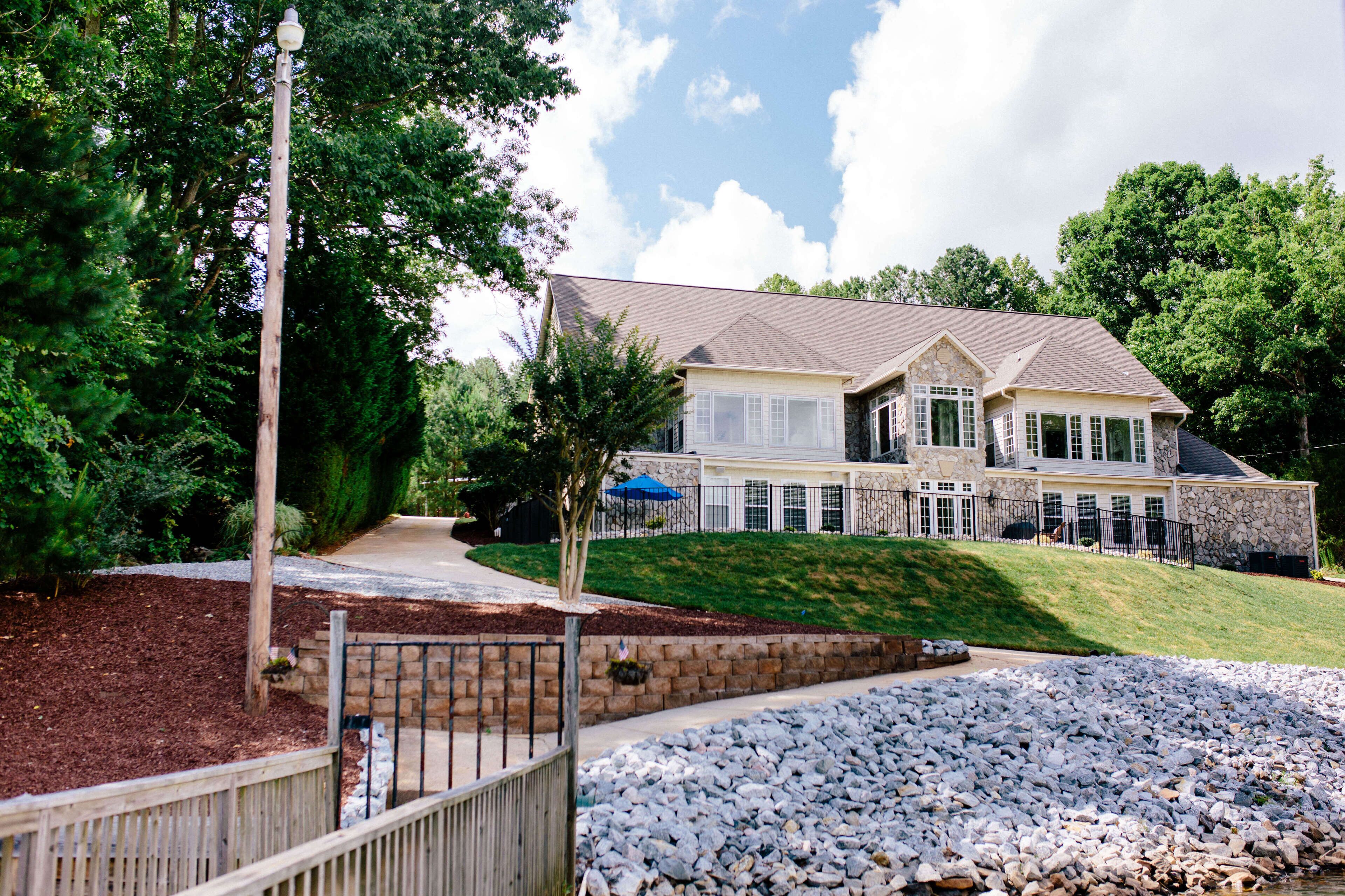 Spacious waterfront home with pool in a quiet cove. Perfect for large families!