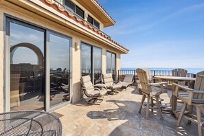 Outdoor dining - Sweeping Views of Ocean and Marsh Await at 5th Floor Turtle Dunes! (Fernandina Beach)