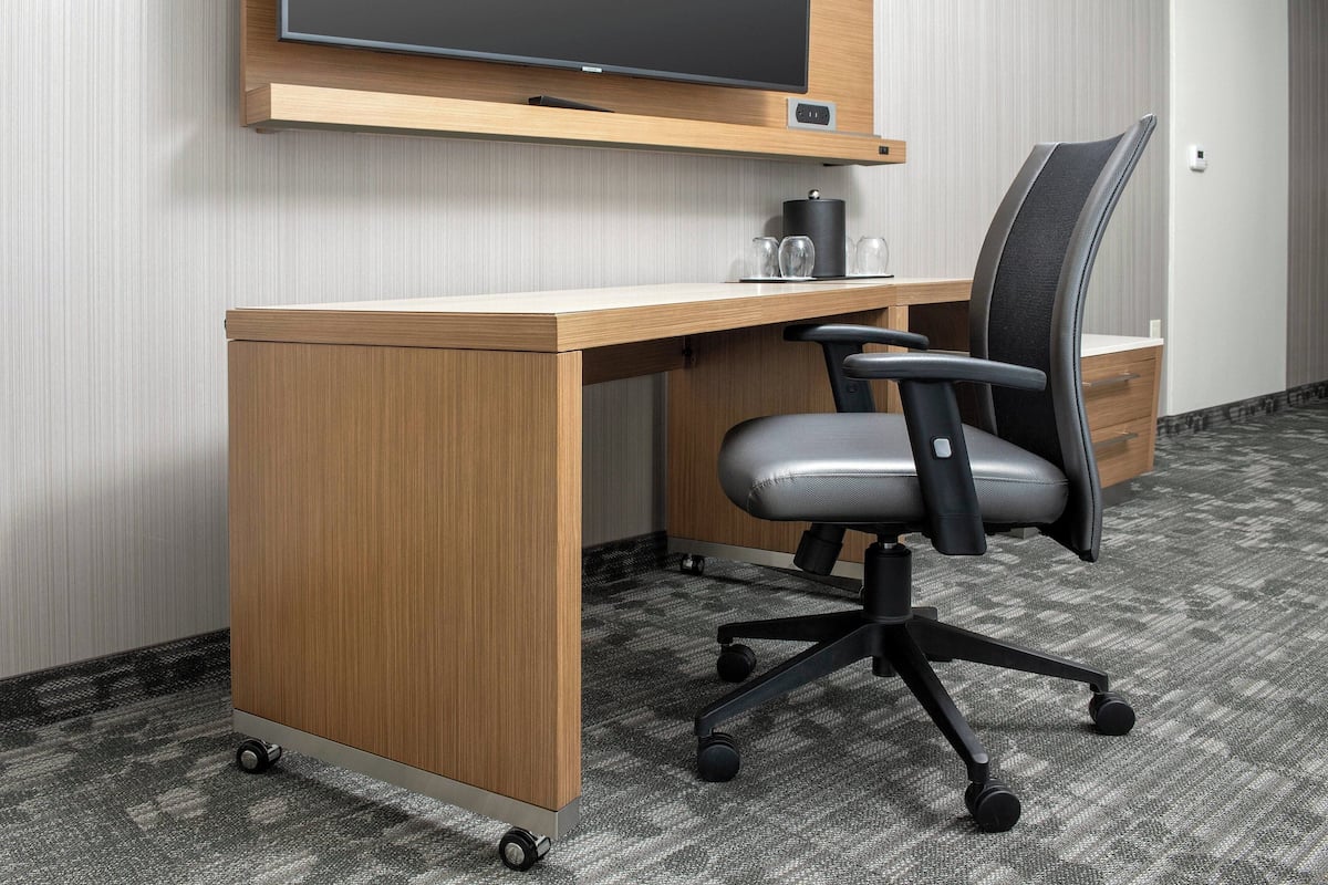 Desk, laptop workspace, iron/ironing board, cots/infant beds