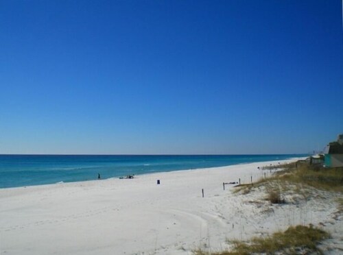 Beachfront 2 bedroom condo just off Thomas Drive. Military/veteran discount.