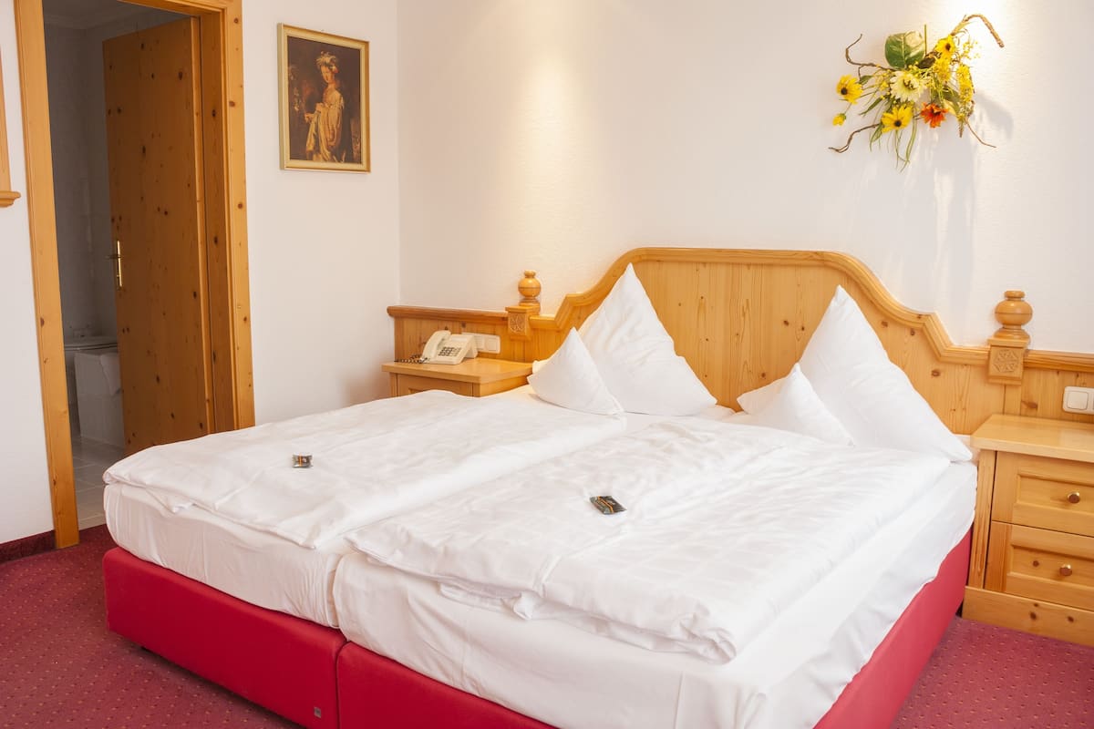 double room, city view | in-room safe, desk, iron/ironing board, cots/infant beds