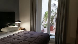 Chambre classique double | 1 chambre, lit avec matelas à plateau-coussin, coffre-fort