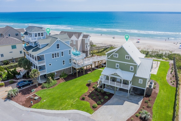Pearl by the Sea(green house) and our Flip Flop Inn (7-bdrm) to the left
