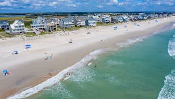 Enjoy beach access and ocean views from your balcony.