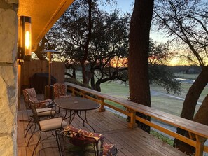 A wooden deck with outdoor furniture, a table, and a bench. - HOME WITH A VIEW!!  Mill Creek and Golf Course (Salado)
