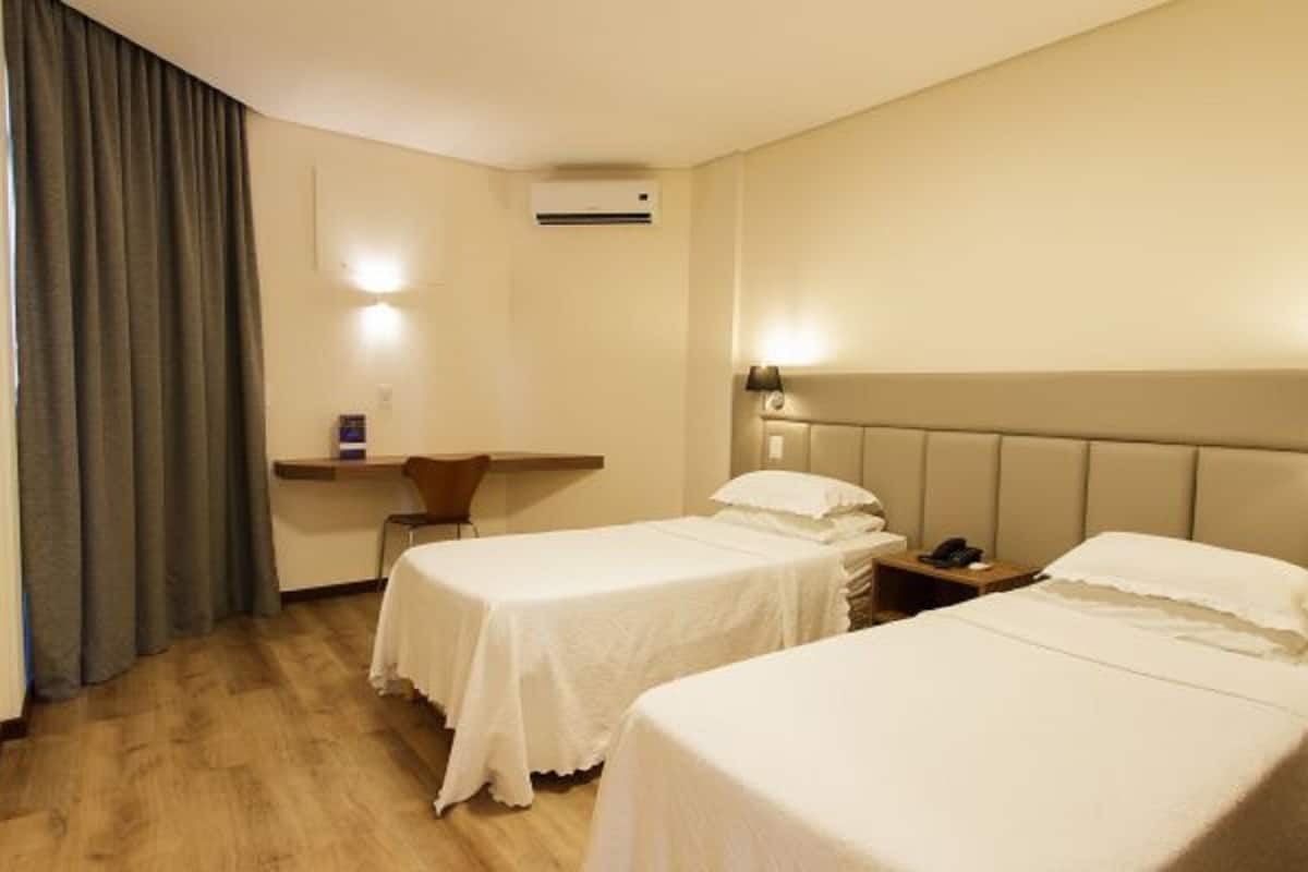 deluxe room, 1 queen bed, non smoking | minibar, laptop workspace, blackout curtains, free wifi