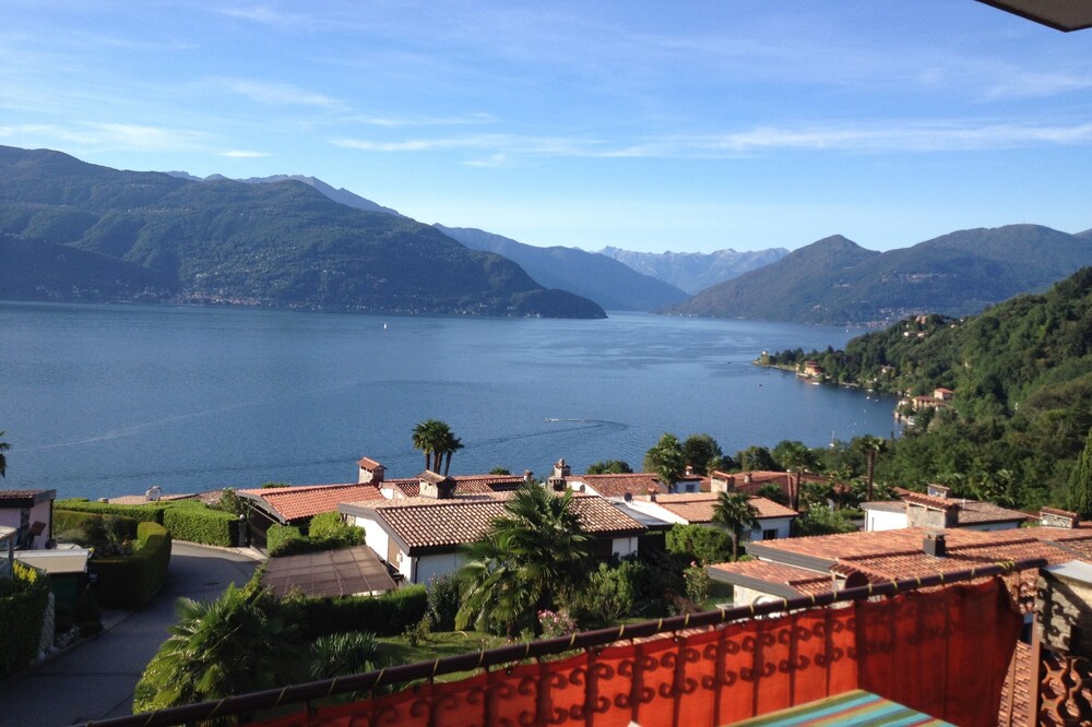 High quality apartment with panoramic lake view balcony, pool, private beach, tennis court