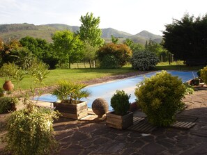 Property grounds - Gîte for 2 people; on one level; with shared swimming pool; (ossès)