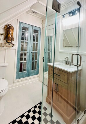 Bathtub, hair dryer, towels, soap