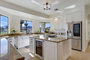 Fridge, microwave, oven, stovetop - Delaware Estate - Incredible Estate with an acre of resort style amenities and endless activities! (Palm Desert)