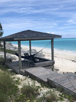 On the beach, sun loungers, beach towels