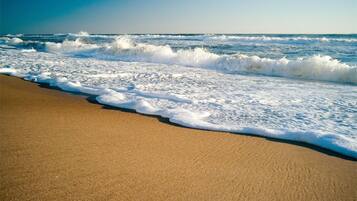On the beach, sun loungers