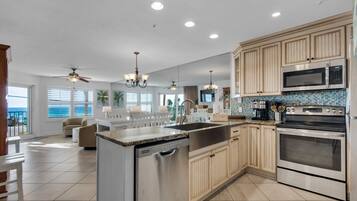 Coffee/tea maker, fridge, microwave, oven