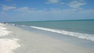 On the beach, sun loungers, beach towels
