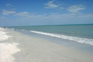 On the beach, sun loungers, beach towels
