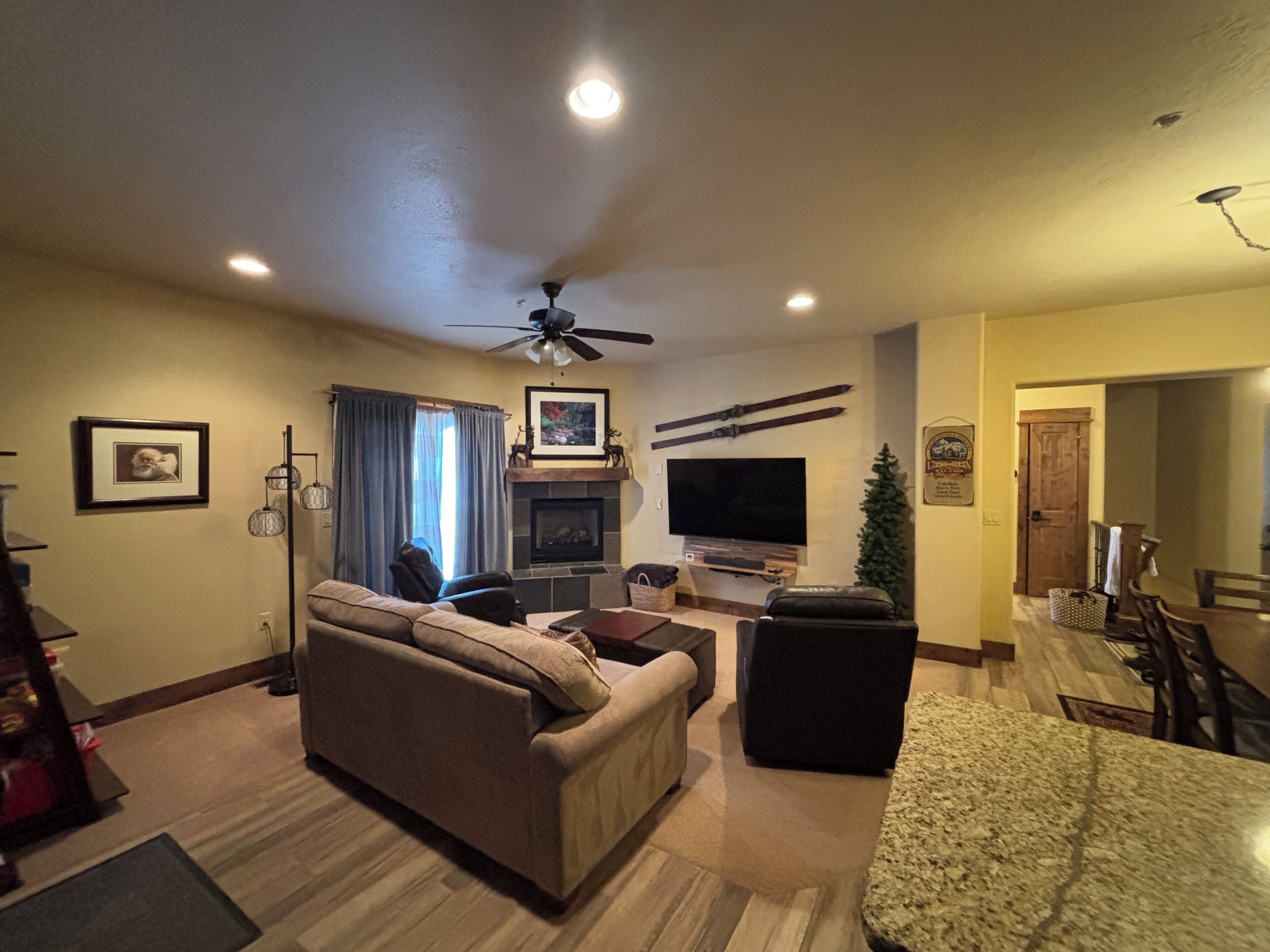 60” flat screen TV w/full cable, DVD blue-ray player, Roku, and sound bar. 