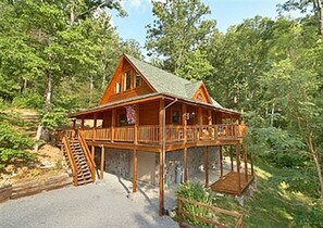 Exterior - Beautiful cabin nestled among the trees, featuring a loft and relaxing hot tub. (Sevierville)