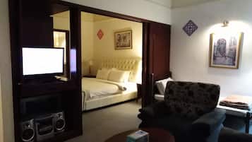 Apartamento superior | Escrivaninha, cortinas blackout, ferros/tábuas de passar roupa