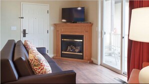 Suite, 1 chambre | Coin séjour