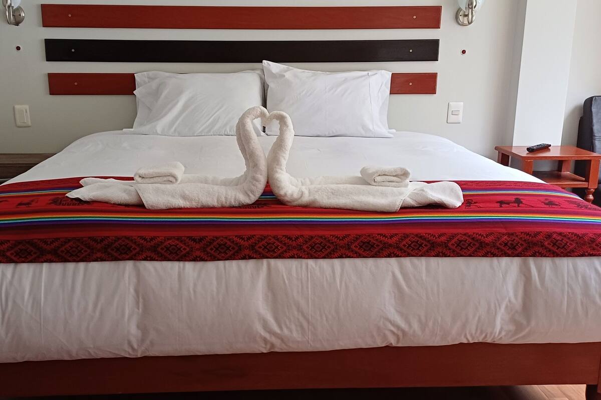 Premium bedding, down duvets, Tempur-Pedic beds, desk