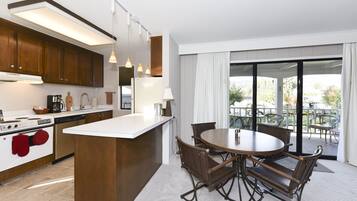 Condo, 1 Queen Bed, Balcony | Private kitchen | Fridge, microwave, oven, stovetop