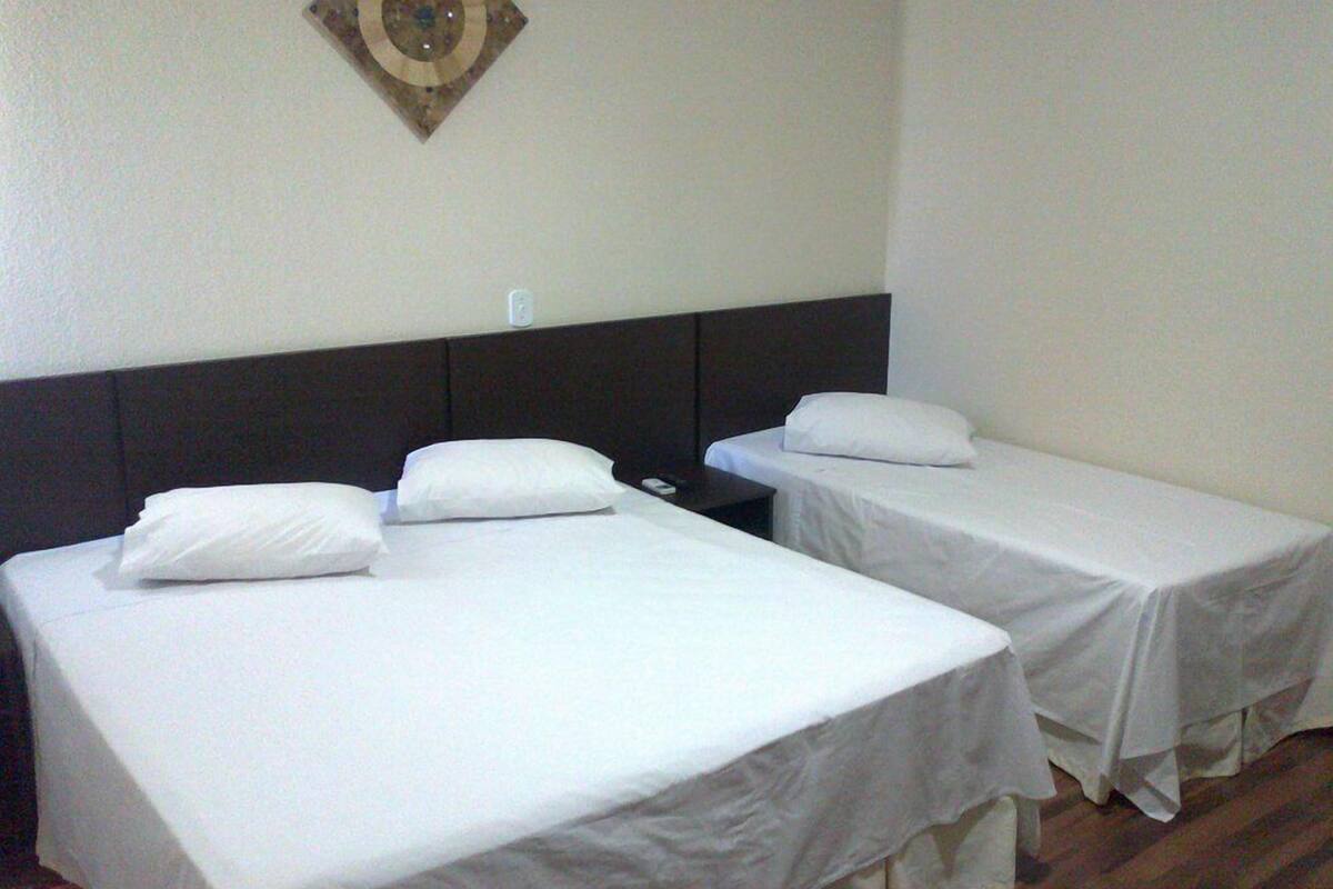 Minibar, desk, blackout curtains, iron/ironing board