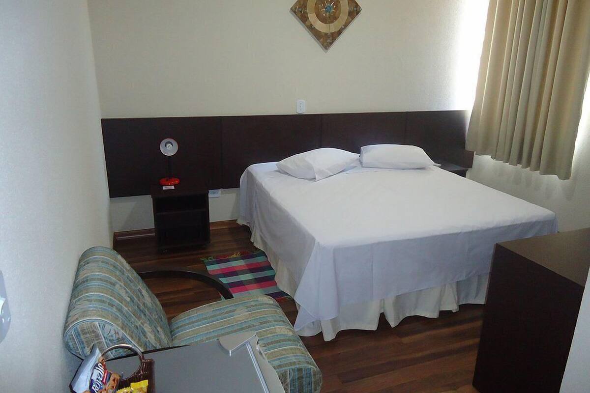Minibar, desk, blackout curtains, iron/ironing board