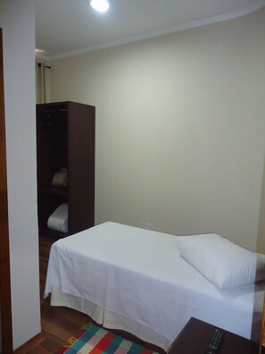 Minibar, desk, blackout curtains, iron/ironing board