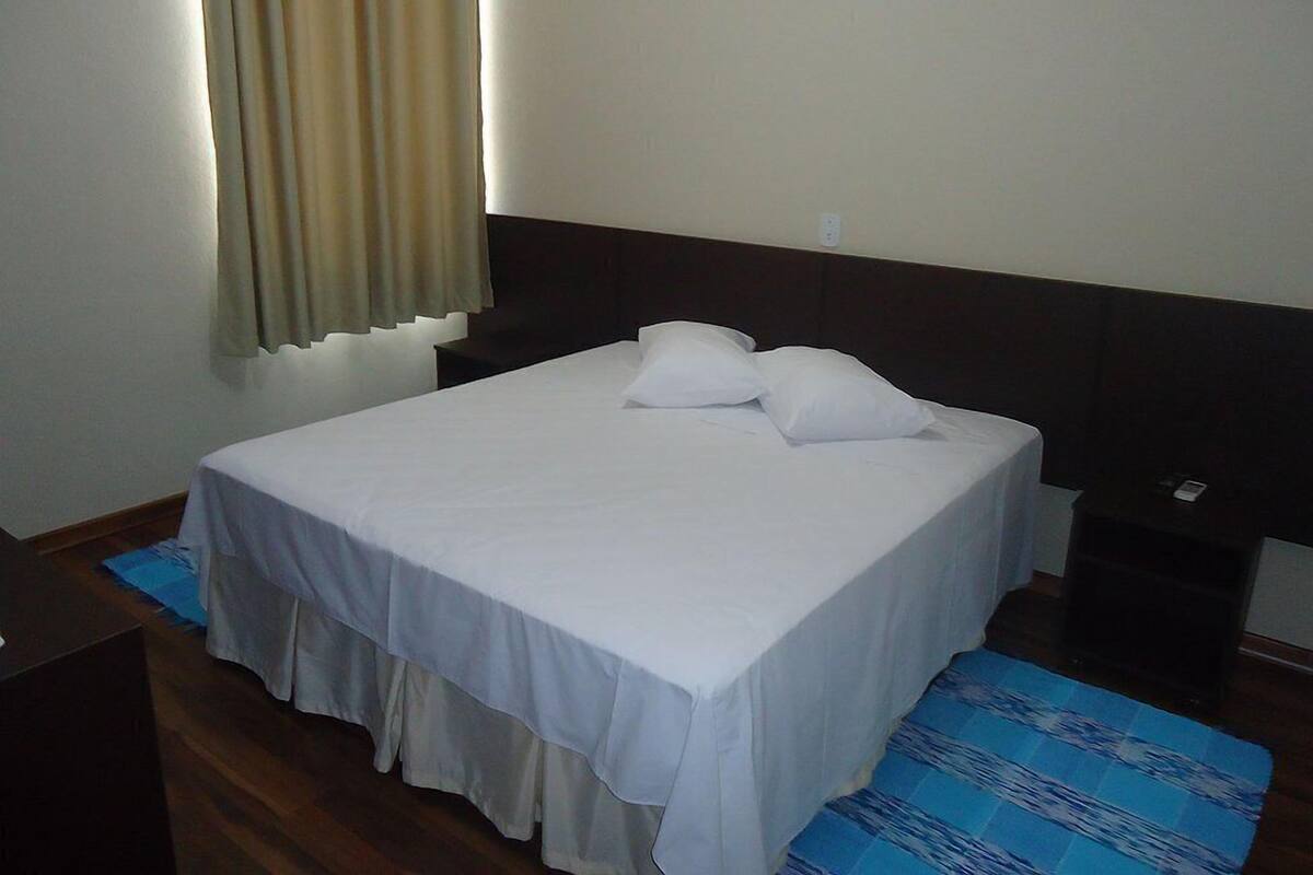 Minibar, desk, blackout curtains, iron/ironing board