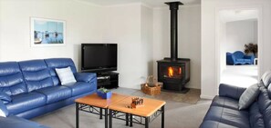 Flat-screen TV, fireplace