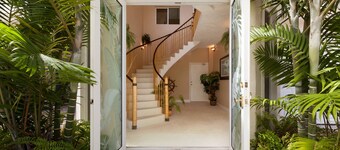 5BR luxury home w/ pool, theater, rooftop deck & 100-ft dock near beach!