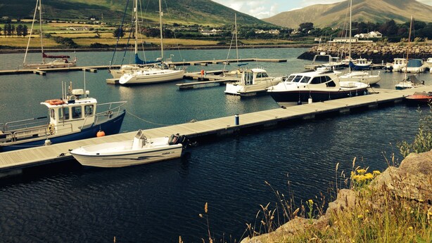 A marina with various boats docked, surrounded by hills and a clear sky. - Cahirciveen Marina, Ring Of Kerry, 2bed/2bath House (Cahersiveen)