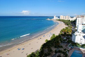 On the beach, sun-loungers, beach towels