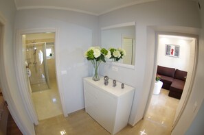 Bathtub, hair dryer, towels