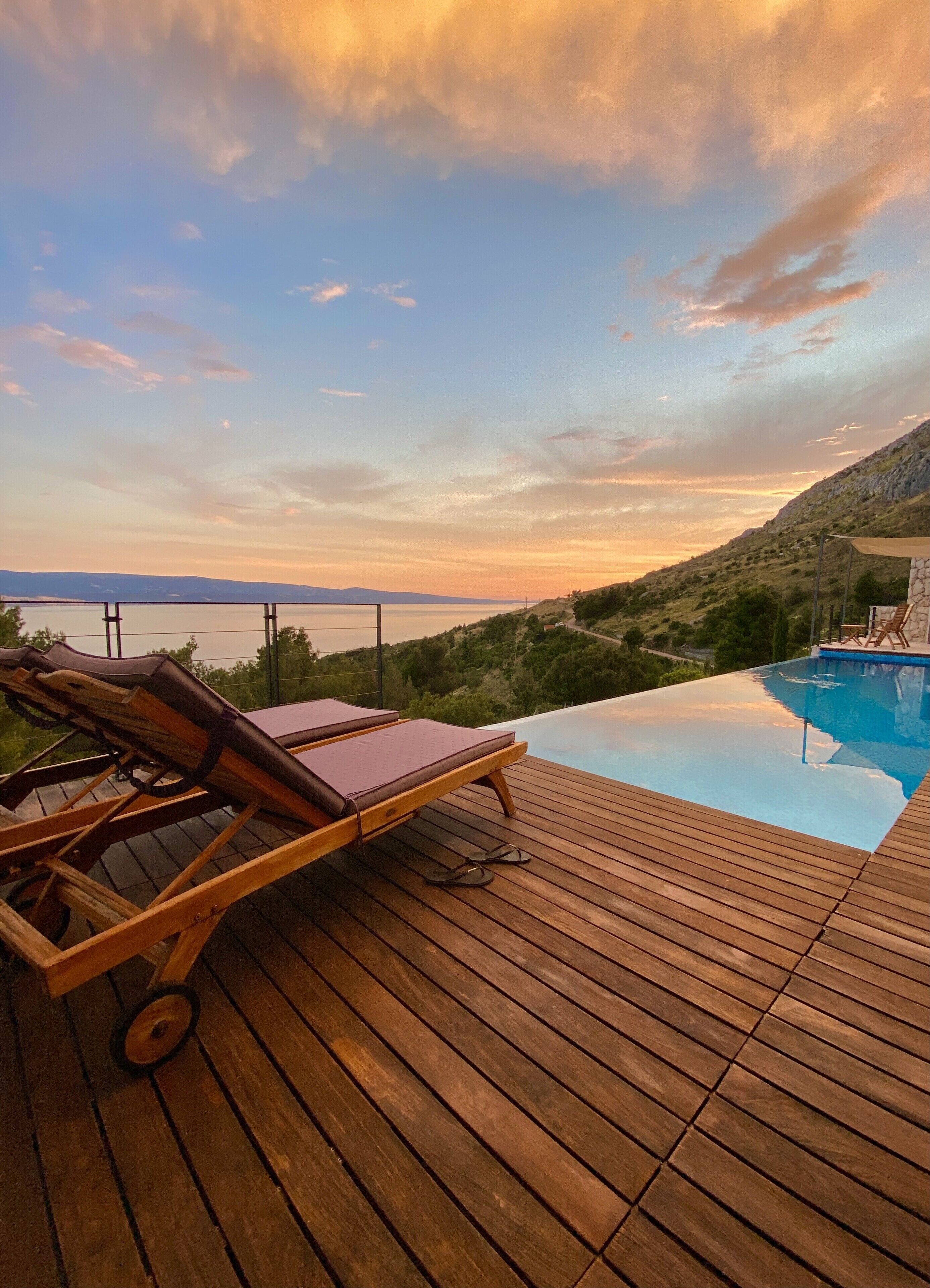 Piscine à débordement, piscine chauffée