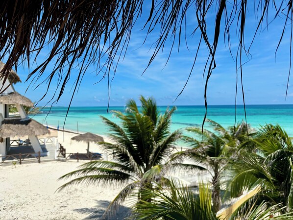 On the beach, sun-loungers, beach towels