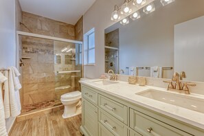 Combined shower/tub, hair dryer, towels, soap