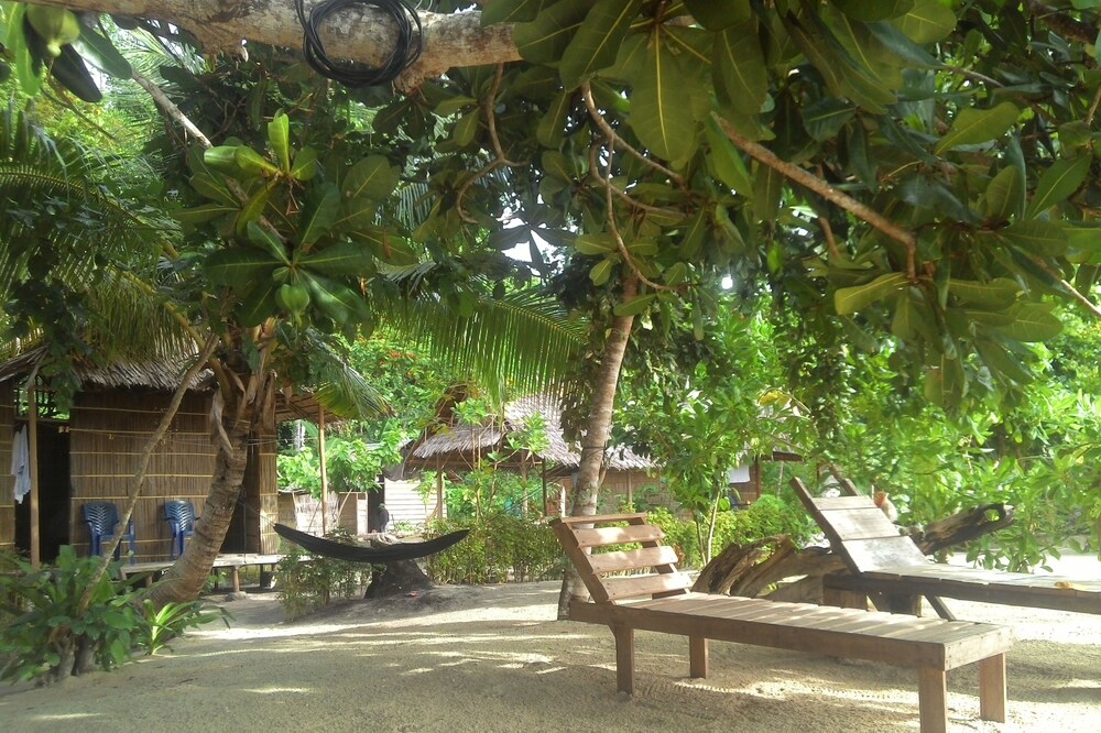 Our Bungalow Set In Front White Sandy Beach Integrated With The Jungle