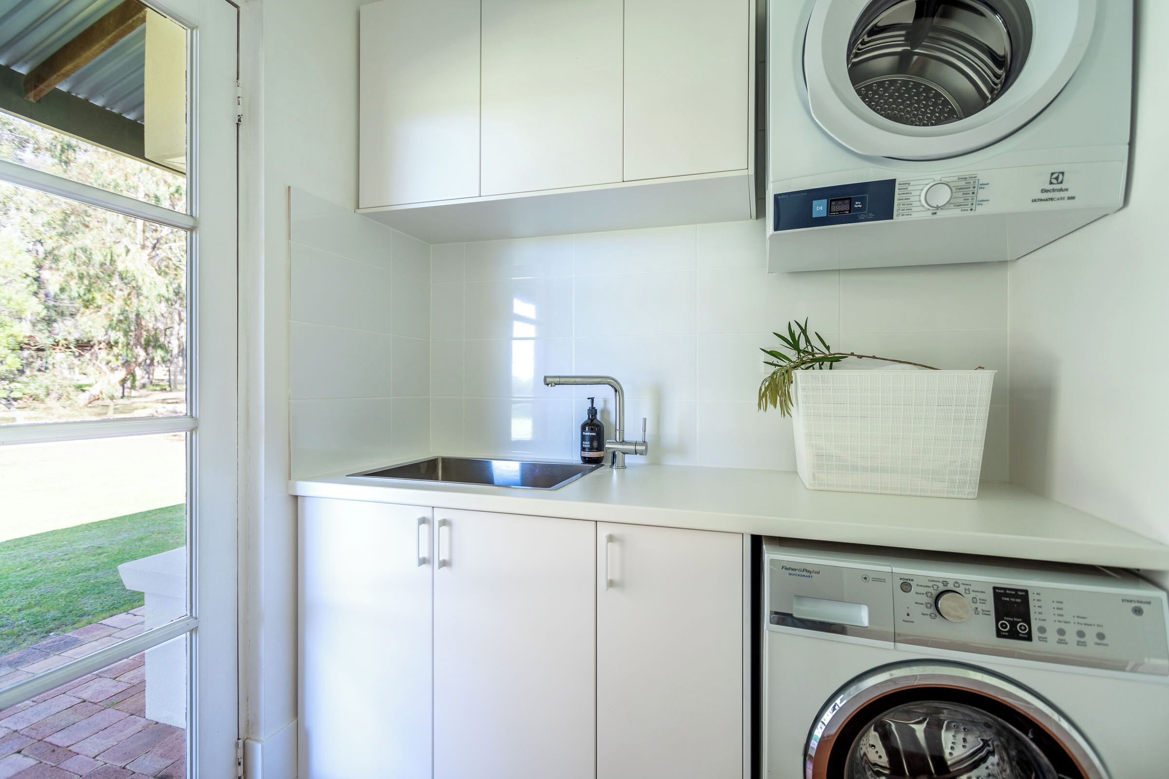 Utility/Laundry with front loader washing machine and dryer
