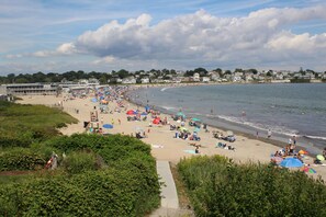 On the beach, sun-loungers, beach towels