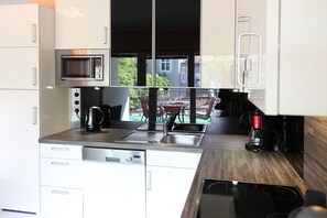 Réfrigérateur, micro-ondes, four, lave-vaisselle