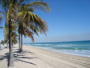 On the beach, sun loungers, beach towels