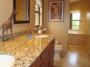 Combined shower/tub, hair dryer, towels, toilet paper